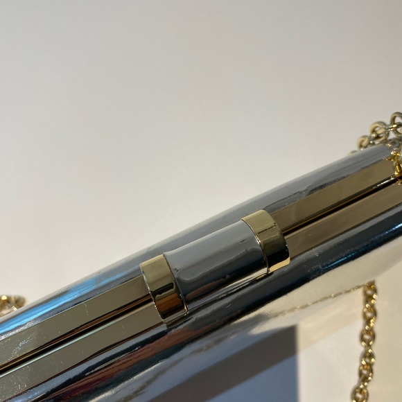 Small silver clutch with gold accents & chain - Picture 2 of 3